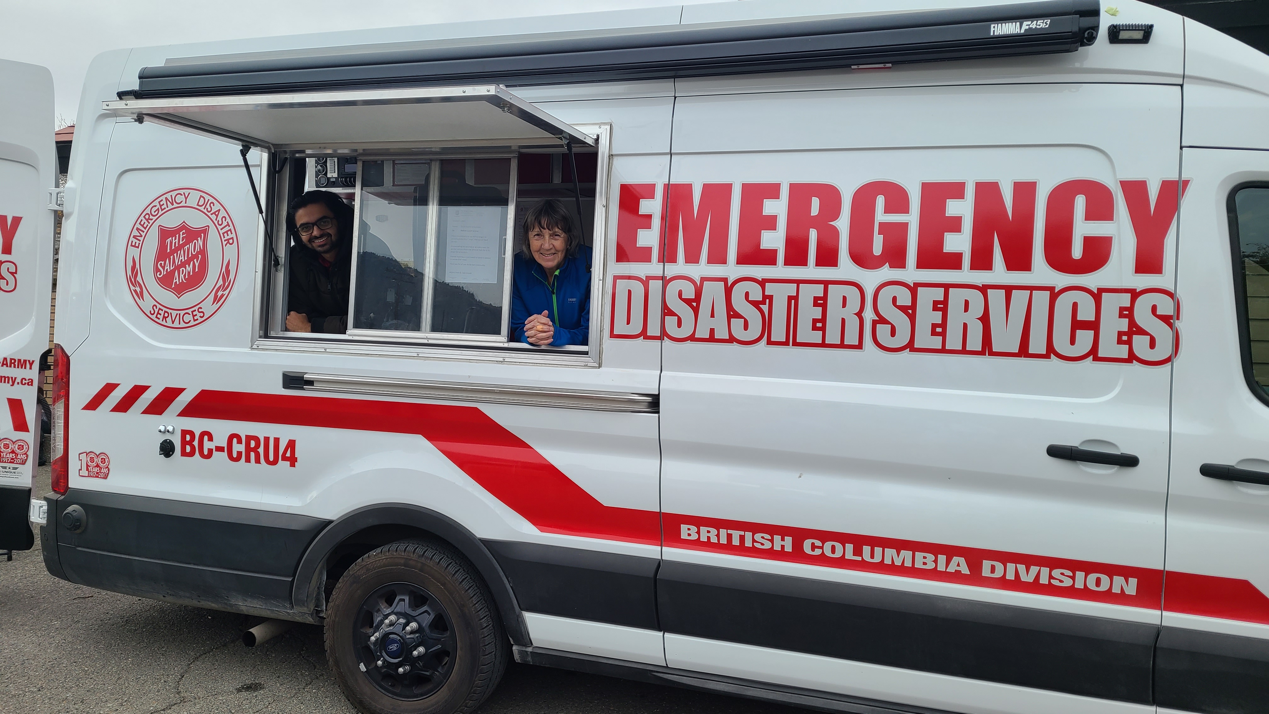 Workers prepare to serve hungry guests